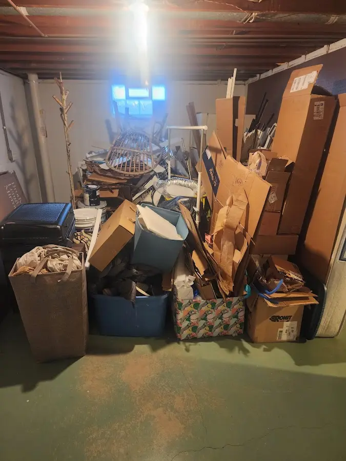 Roll-off dumpster container at job site for 15 Yard Dumpster Rental in Hudson